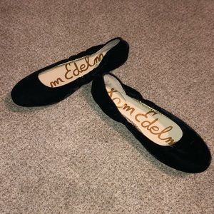 Black suede flats